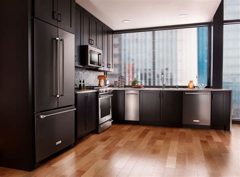 picture of black stainles steel appliance with wood cabinets|black stainless steel kitchen cabinets.